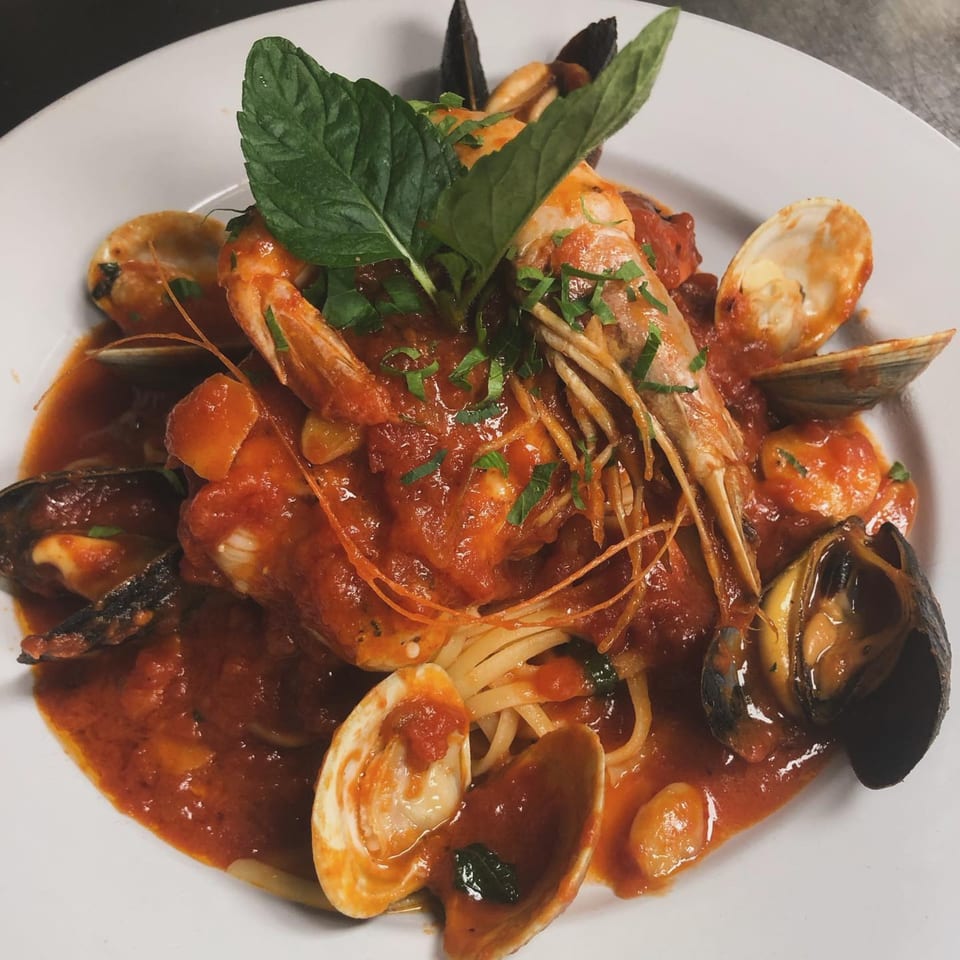 Buona Sera Ristorante's linguine pasta with shrimp, clams, and mussels in a rich red sauce.